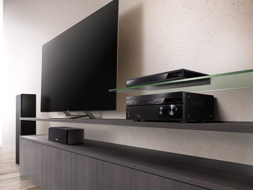 Sony STR-DN1080 7.2 ch Surround Sound Home Theater AV Receiver displayed beside a tv