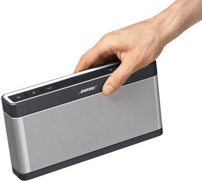 Bose SoundLink 3 carried by a right hand
