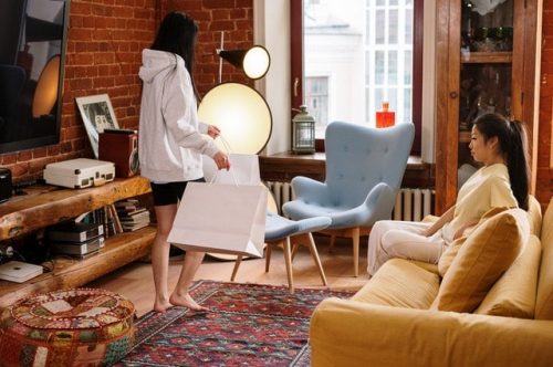 two women in a cozy living room