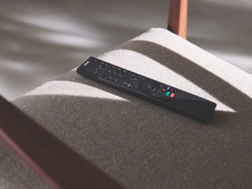 remote control placed on chair